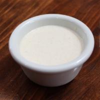 Alabama White Bbq Sauce · Tangy, creamy with a slight horseradish spice.