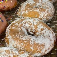 Classic Dozen Donuts · Flavors Included: Cream Cheese Icing, Strawberry Icing with Rainbow Sprinkles, Chocolate Ici...