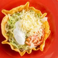 Taco Salad · CRISPY FLOUR TORTILLA BOWL WITH YOUR CHOICE OF MEAT, BEANS, LETTUCE, TOMATO, SOUR CREAM  & S...