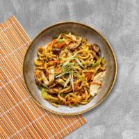 The Fiery Udon · Sauteed udon noodles with Napa, carrot, zucchini, and onion scallion zled with hot chile oil.