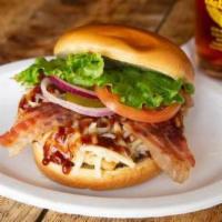 Supreme Bbq Chicken Sandwich · Grilled chicken breast topped with applewood-smoked bacon. Monterey jack cheese and sweet/sp...