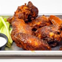 Slider House Wings · Eight jumbo wings tossed in your choice of housemade sauce, bloody Mary, sriracha honey, buf...