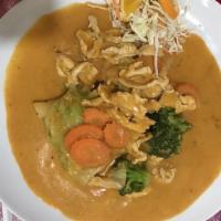 Green Curry · A thai green curry cooked with bell peppers, onions, mushrooms, baby corn, bamboo shoots, ca...