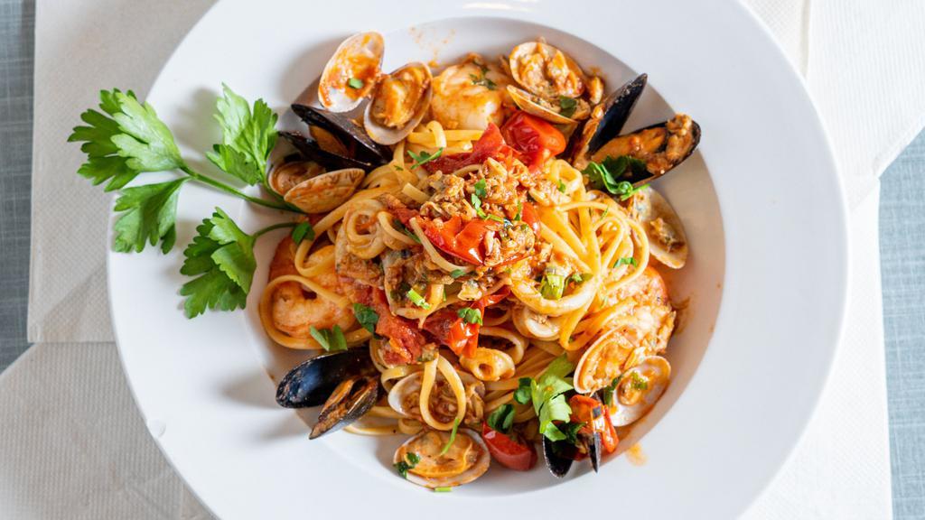 Linguine Pescatore · Sautéed Clams, Mussels, Calamari, And Black Tiger Shrimp In Marinara Sauce Over Linguine Pasta.