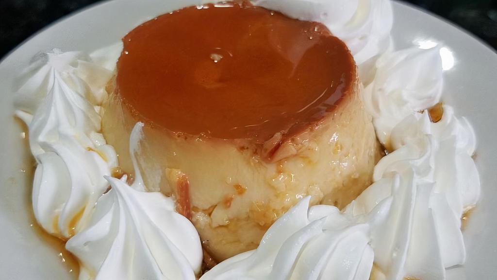 Dulce De Leche Cheesecake · Rich creamy cheesecake swirled with caramel in a graham cracker crust. Topped with caramel mousse and caramel drizzled on top.