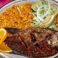 Mojarra · Fresh tilapia deep-fried to a golden brown. Served with guacamole, rice, and tortillas.