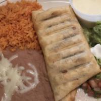 Chimichanga Lunch · We stuff a flour tortilla with your choice of shredded beef or chicken, then deep-fried to a...