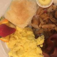 Country Breakfast · Two eggs cooked to order, choice of breakfast potatoes or cheese grits, choice of bread. Add...