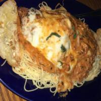 Chicken Parmesan · Fresh marinara with melted mozzarella, provolone and Parmesan cheese served with capellini p...