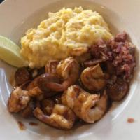 Bbq Shrimp & Grits · Jumbo shrimp, spicy BBQ sauce and stone ground cheese grits.