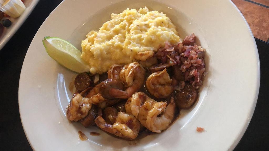 Bbq Shrimp & Grits · Jumbo shrimp, spicy BBQ sauce and stone ground cheese grits.