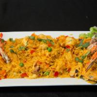 Arroz Con Mariscos · A mixture of clams, mussels, shrimp and scallops and yellow rice.  (Suggested Wine: Temprani...