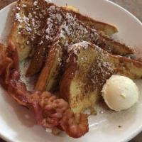 French Toast Combo · 2 thick slices of Texan toast, covered with cinnamon and powdered sugar, 2 eggs, and 2 piece...