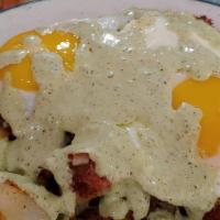 Corned Beef Hash Special · A thick serving of corn beef hash on a bed of home-fried potatoes, topped with 2 eggs and ho...