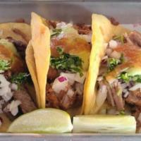 Tacos · 2 tacos in corn or flour tortilla with choice of eggs with meat, pico, cotija cheese and avo...