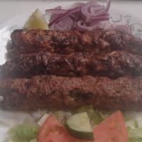 Chicken Seekh Kebab · (3 pieces in one order). Ground chicken mixed with Indian spices and grilled on skewers.