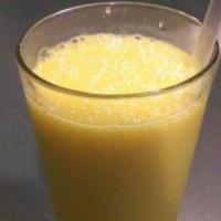 Mango Lassi · Homemade Mango drink with ice, sugar, and yogurt.