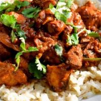 Chicken Tikka Over Rice · BBQ pieces of tikka over rice with a choice of lettuce, tomato, cucumber, onion, olives, pic...