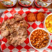 Pulled Pork Plate · Served with two hush puppies or a bun and two sides.