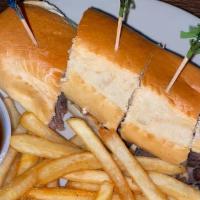 French Dip · Hot roast beef and melted provolone cheese served on a toasted sub roll with au jus for
dipp...