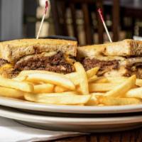 Bambino Patty Melt  · A charbroiled beef patty topped with sautéed onions melted American and swiss cheeses
and ma...