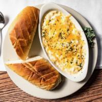Chesapeake Crab Dip · A tasty tidewater favorite. A creamy, oven-baked blend of cream cheese and Parmesan, lump cr...