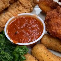 Combo Basket · A combination of three of your favorites. A generous portion of chicken tenders, mozzarella ...