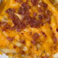 Loaded Fries · Smothered in melted cheddar and monterey jack cheeses and topped with premium bacon pieces. ...