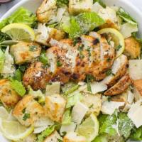Ceasar Salad · Fresh romaine leaves topped with grated Parmesan cheese and garlic croutons tossed with our ...