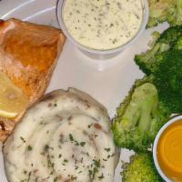 Grilled Salmon · Flame grilled boneless and skinless Atlantic salmon filet served grilled or blackened.

Cons...