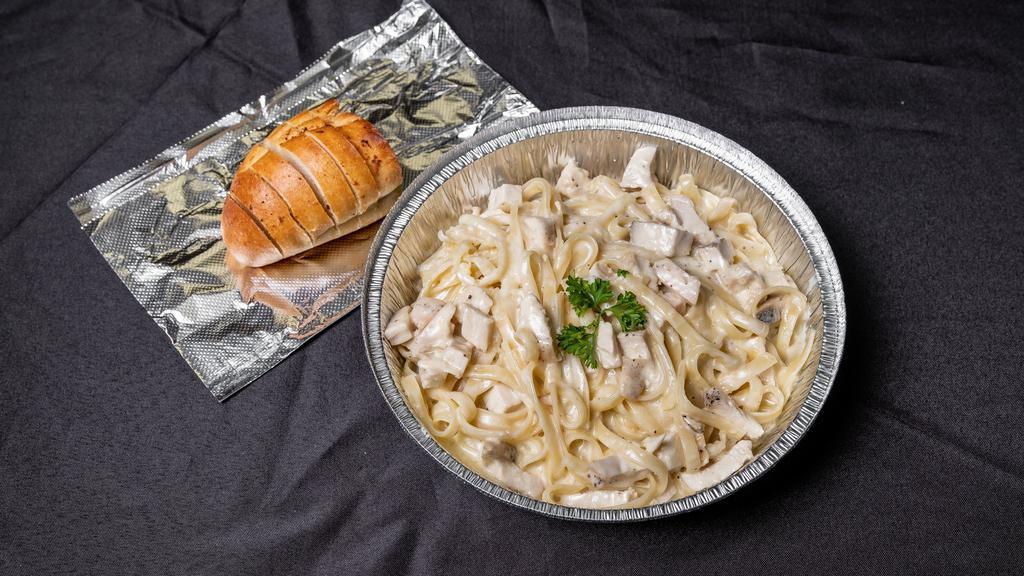 Chicken Alfredo · Chicken Alfredo has a creamy blend of cheeses and cream along with fresh baked chicken for a hearty dish.