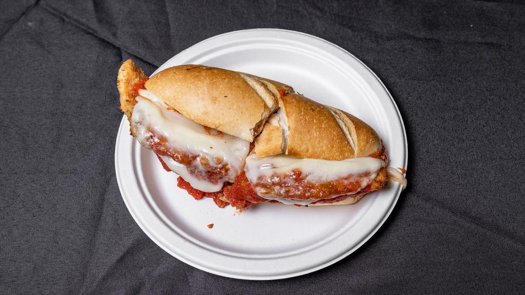Chicken Parmesan  · A delicious  breaded chicken breast topped with marinara sauce and mozzarella cheese baked in the oven on fresh bread