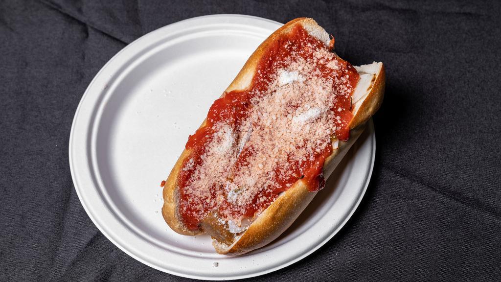 Sausage Parmesan · Delicious grilled sausage smothered in marinara sauce topped with mozzarella cheese and baked on fresh bread