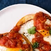 Huevos Rancheros · Ranch style eggs. served with rice and beans.