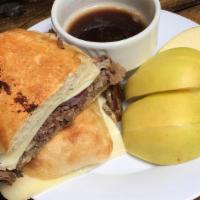 French Dip · Served with sliced usda prime ribeye loin, grilled onions, swiss cheese, and a horseradish d...