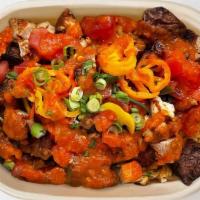 Spicy Jollof Chicken Bowl · Free range chicken thigh, spicy jollof rice, sauteed peppers x onions, Appharvest tomato, pi...