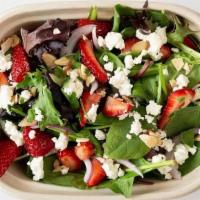 Strawberry Fields Salad · Farm greens, fresh strawberries, shaved red onion, sliced almonds, goat cheese and fresh min...