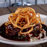 Medallians Of Beef · smashed potatoes, red wine sauce, tobacco onions, choice of garden salad
