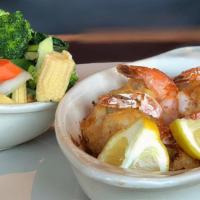 New England Style Stuffed Shrimp · Stuffed with crabmeat, a choice of two sides