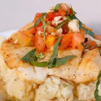 Citrus Cod · served over smashed potatoes with a tangy citrus sauce topped with tomato basil