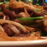 Beef Chow Fun · Broad rice noodles, onions, scallions, carrot and napa cabbage.