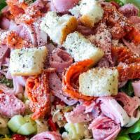The Italian Chopped Salad · Prosciutto, ham, and salami with artichoke, cucumber, green onion, diced tomato, olive salad...