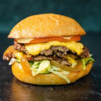 Crow Burger · Double 3oz patties with house American cheese, charred onion, Iceberg lettuce, tomato, house...