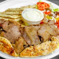 Mix Plate · Gyro and chicken served on top of rice, with your choice of lettuce, tomatoes, onions and cu...