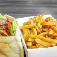 Gyro Sandwich W Fries · served with your choice of fresh lettuce, tomatoes, onions, cucumbers, mushroom, fat cheese,...