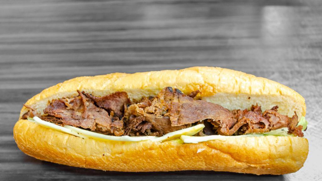 Philly Cheesesteak Sandwich · Seasoned beef comes with your choice of banana pepper, mushroom, green peppers, onions and jalapeño peppers.