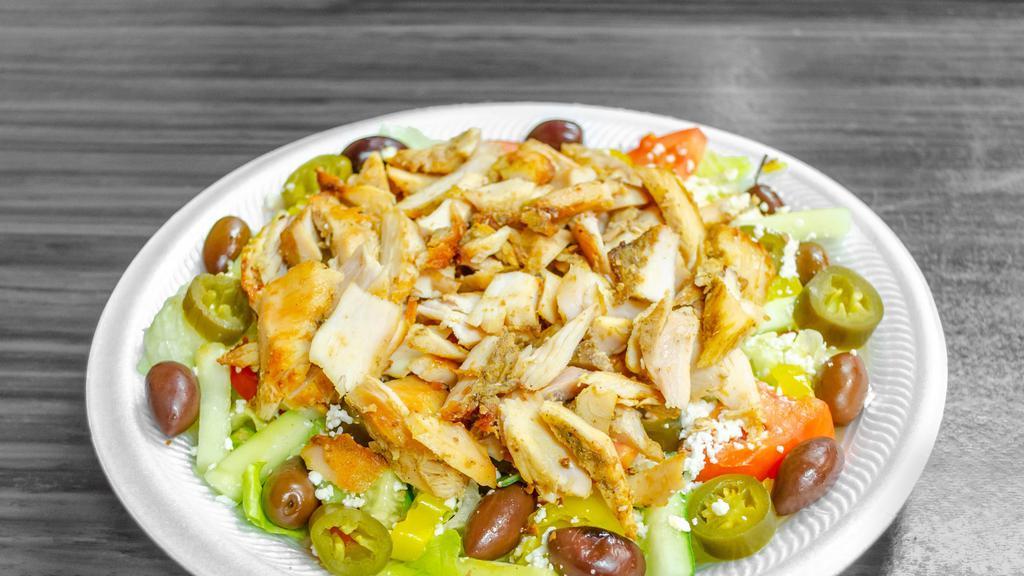 Shawerma  Salad · Shawerma served with your choice of fresh lettuce, tomatoes, onions, cucumbers or tabbouleh salad, pita bread with ranch or cucumber dressing.