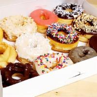 Assorted Dozen Donuts  (Randomly) · Filled donuts and big donuts are not included in this order.  This order will include glazed...