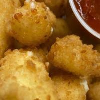Cheese Curds ( Fried) · Cheddar cheese curds lightly fried and served with your choice of sauce,. Perfect tasty bite...