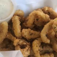 Fried Banana Peppers · Banana pepper rings ightly dipped in our house batter fried to golden brown